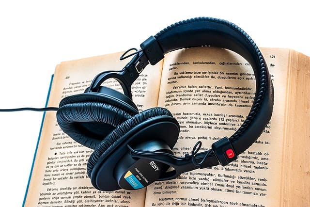 headphones placed on a book
