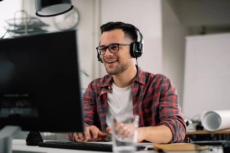 man in front of a computer