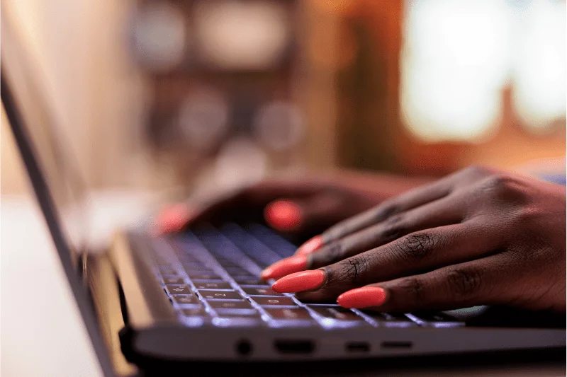hands on a computer keyboard
